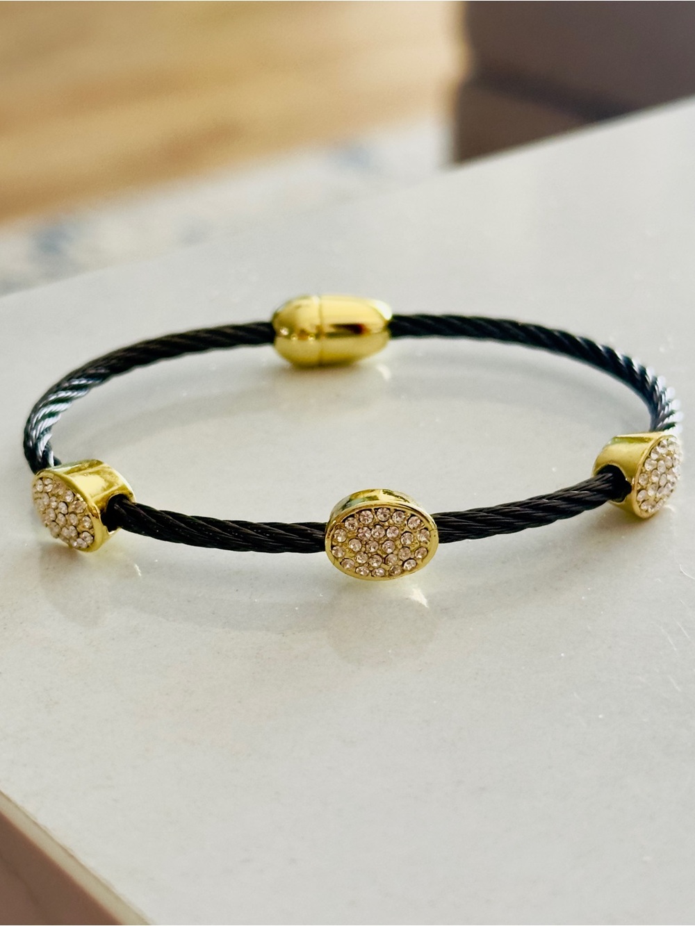 Black Twisted Cable with Gold Station Bangle Bracelet